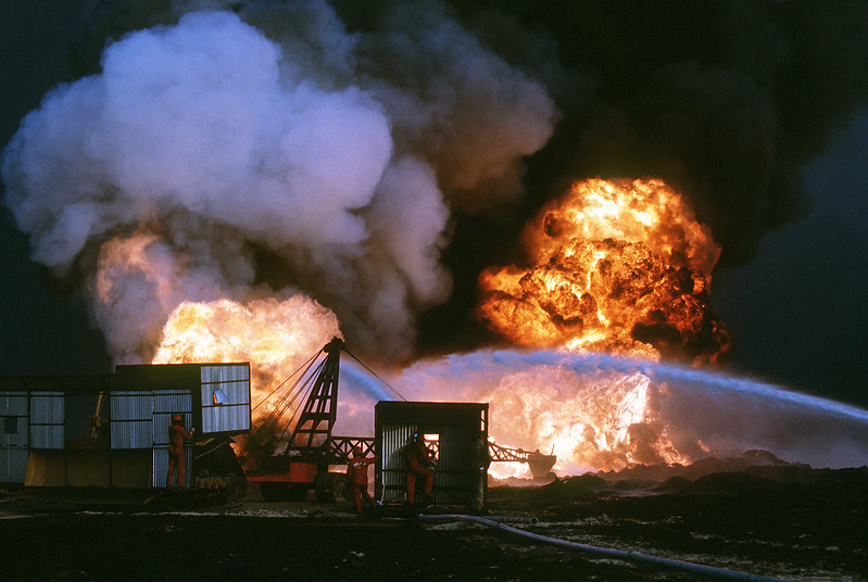Photo of firefighters battling oil well blaze during Operation Desert Storm