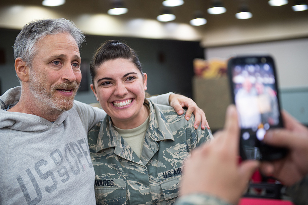 Jon Stewart Poses for Photo with Servicemember